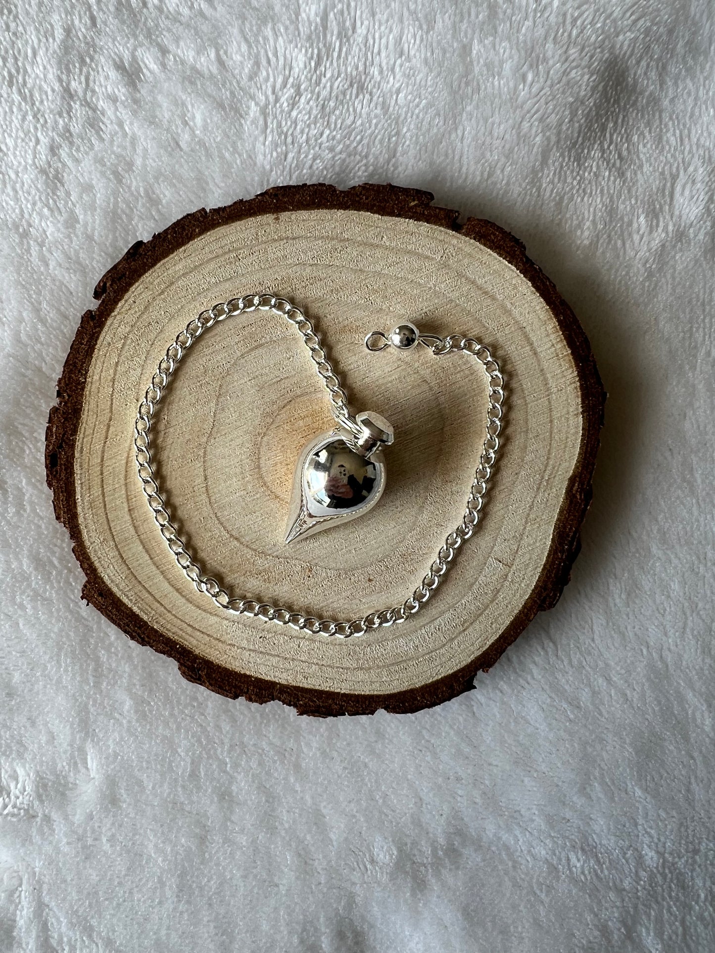 Pendule goutte en acier