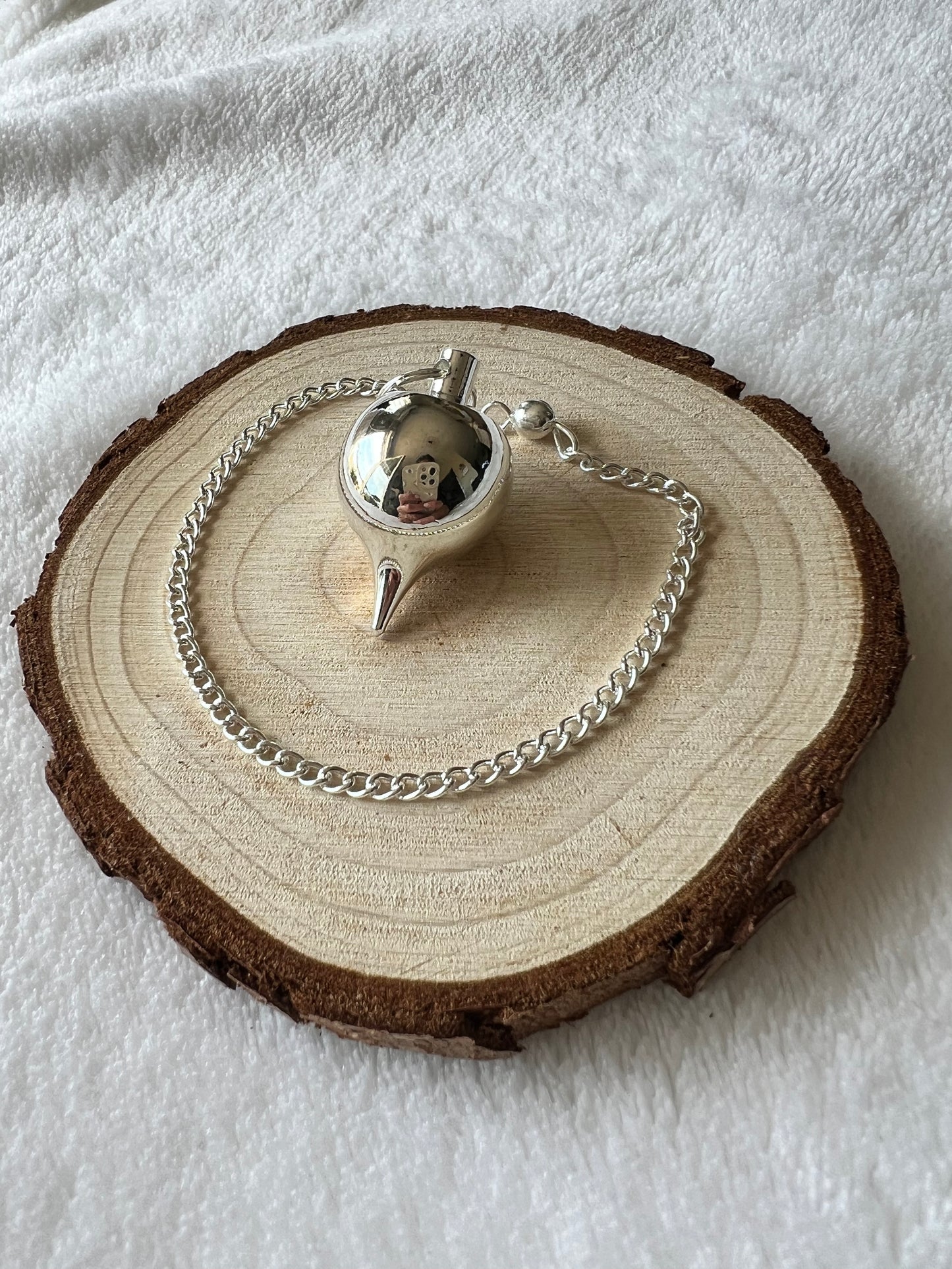 Pendule goutte en acier