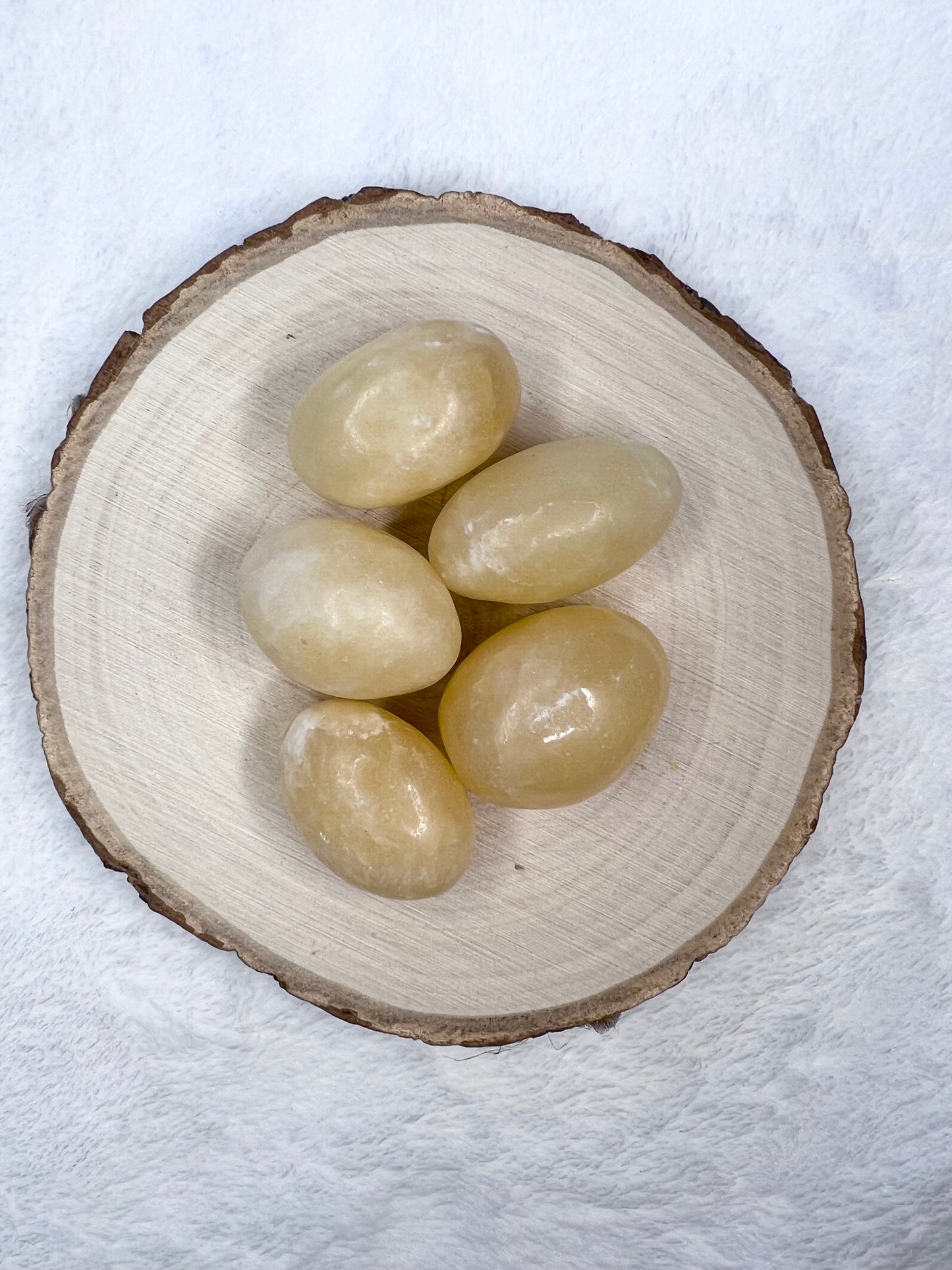 Pierre roulée en calcite orange